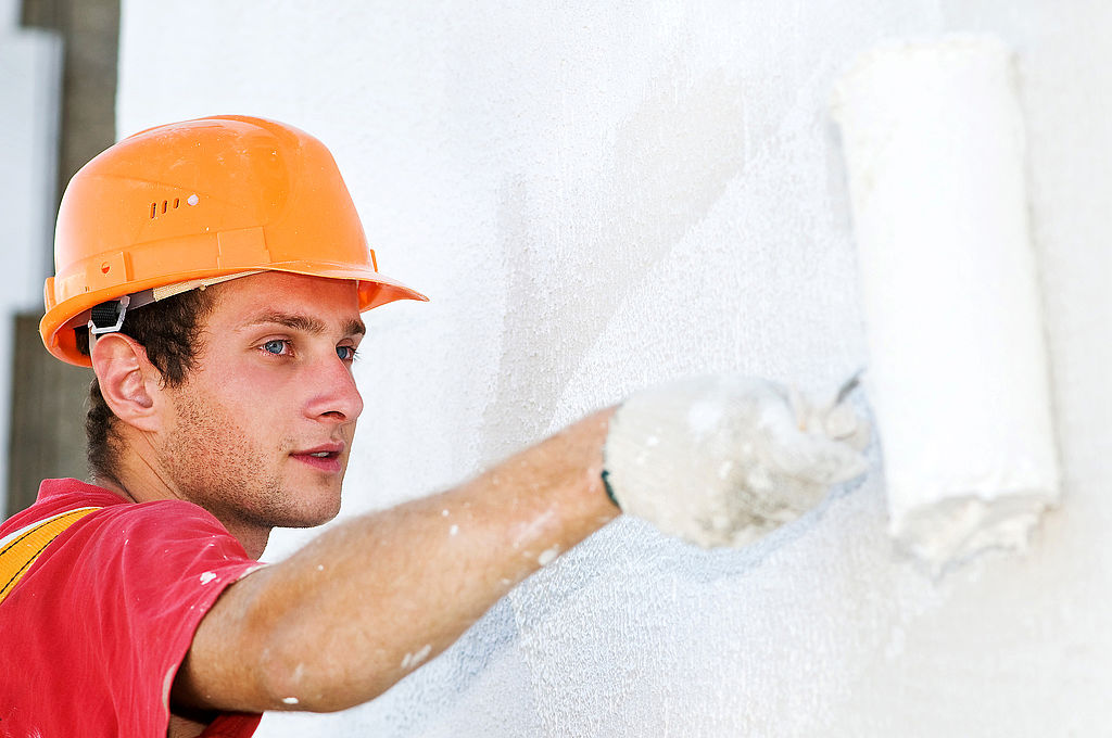 builder facade painter at work