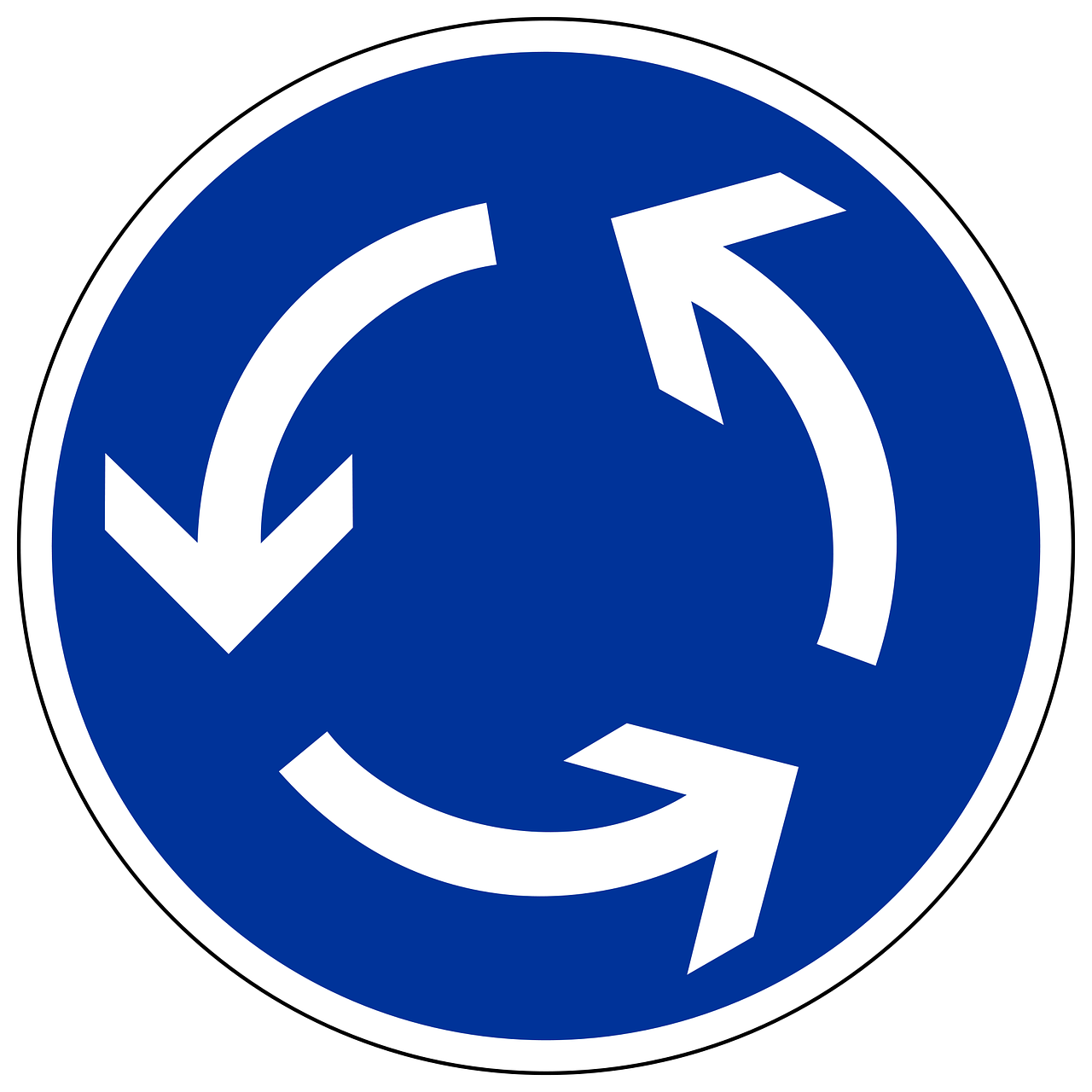Blaues, rundes Verkehrsschild mit weißen Pfeilen nach links zeigend - Kreisverkehr